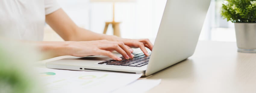 Freelance-young-asian-businesswoman-casual-wear-using-laptop-working-in-living-room-at-home.jpg