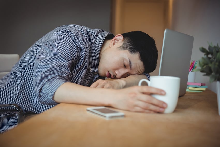 02_business-executive-sleeping-at-his-desk.jpg