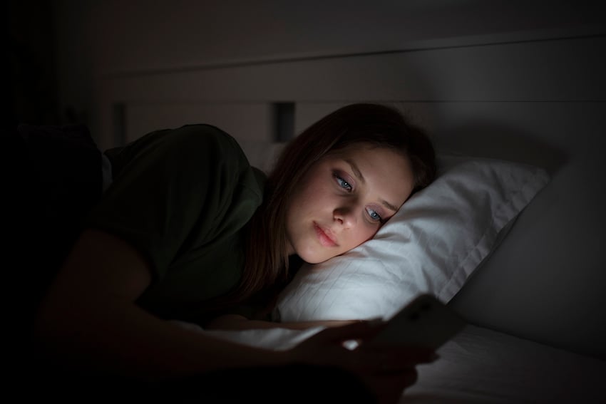 03_young-woman-suffering-from-social-media-addiction.jpg